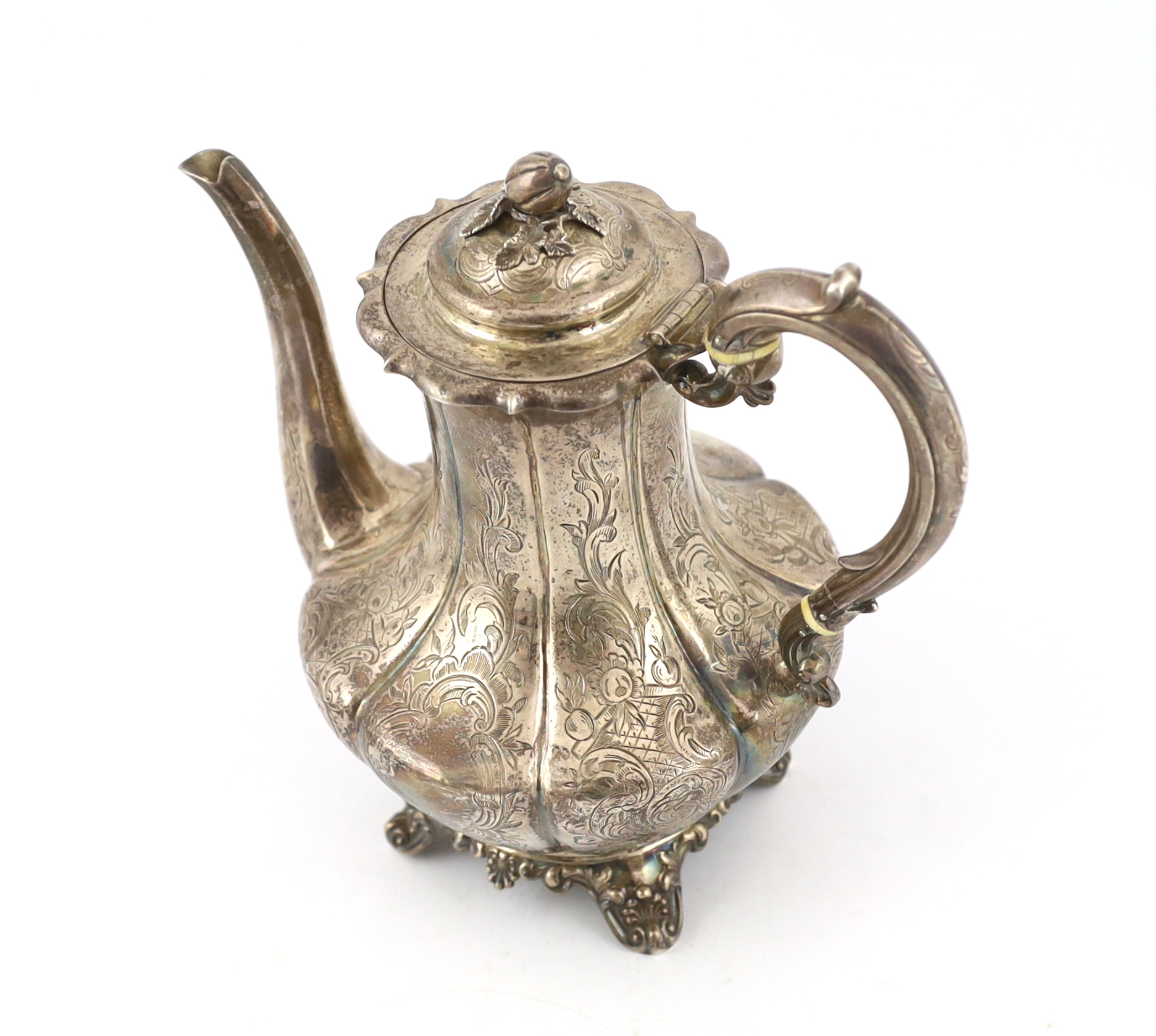 A Victorian engraved silver melon shaped coffee pot and cover with melon finial, by William Hunter, CITES Submission reference Y1TEMWCY